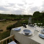 Table set for a meal overlooking the savanna